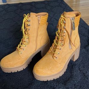 Nine West fashion construction boots with heel